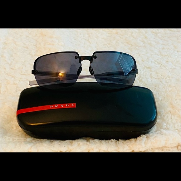PRADA lightweight aviators in black, 0S, never worn